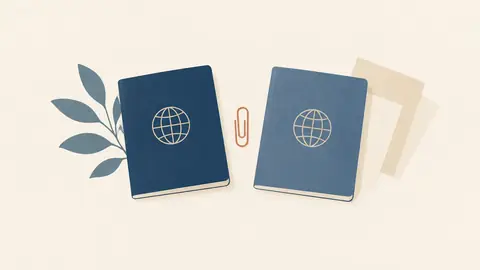 Illustration of two passports side by side with a paperclip between them