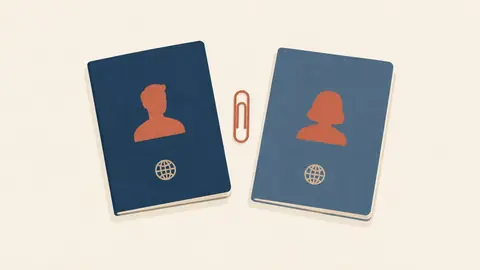 Illustration of two passports side by side with a paperclip between them